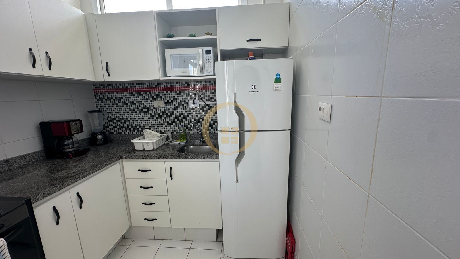 Apartamento na Praia das Pitangueiras, Guarujá - SP