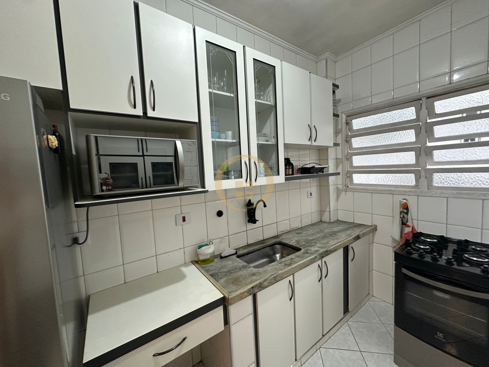Apartamento na Praia das Pitangueiras, Guarujá - SP