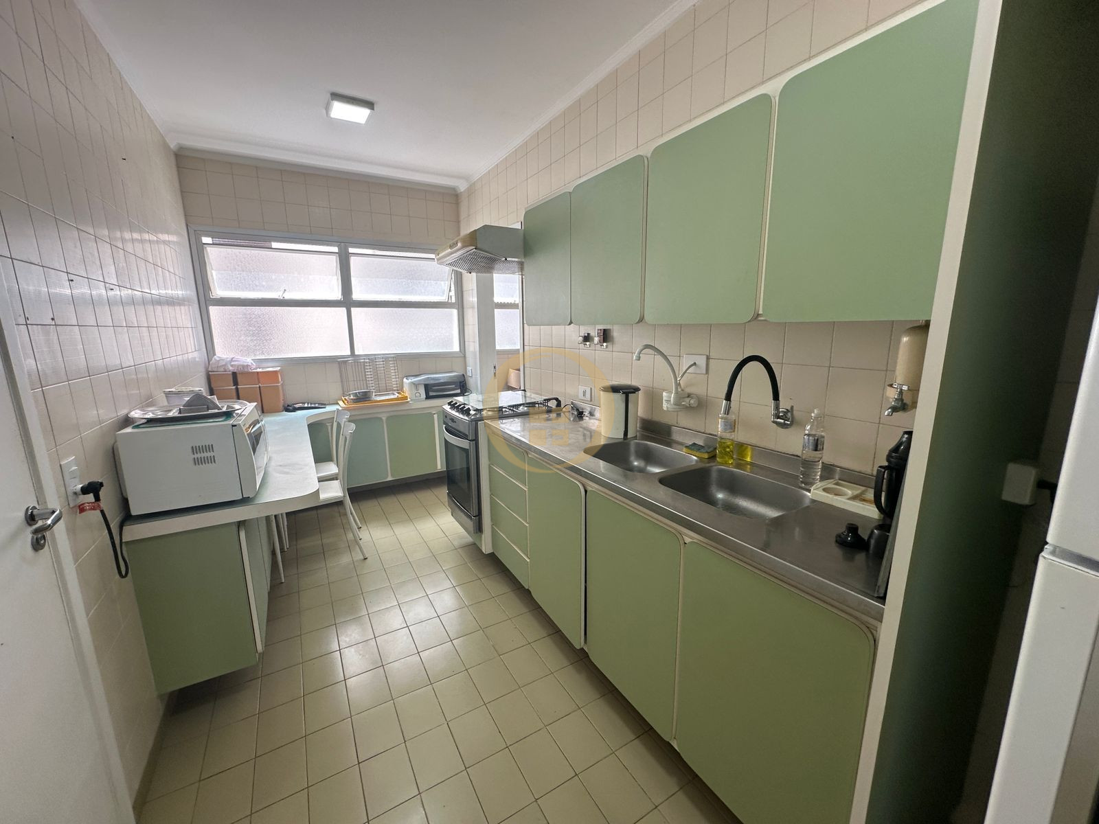 Apartamento na Praia das Pitangueiras, Guarujá - SP