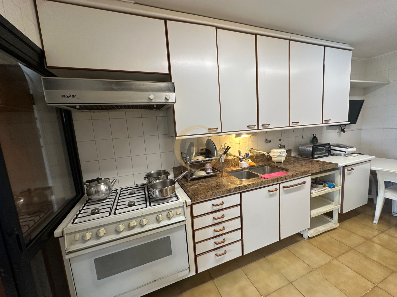 Apartamento na Praia das Pitangueiras, Guarujá - SP