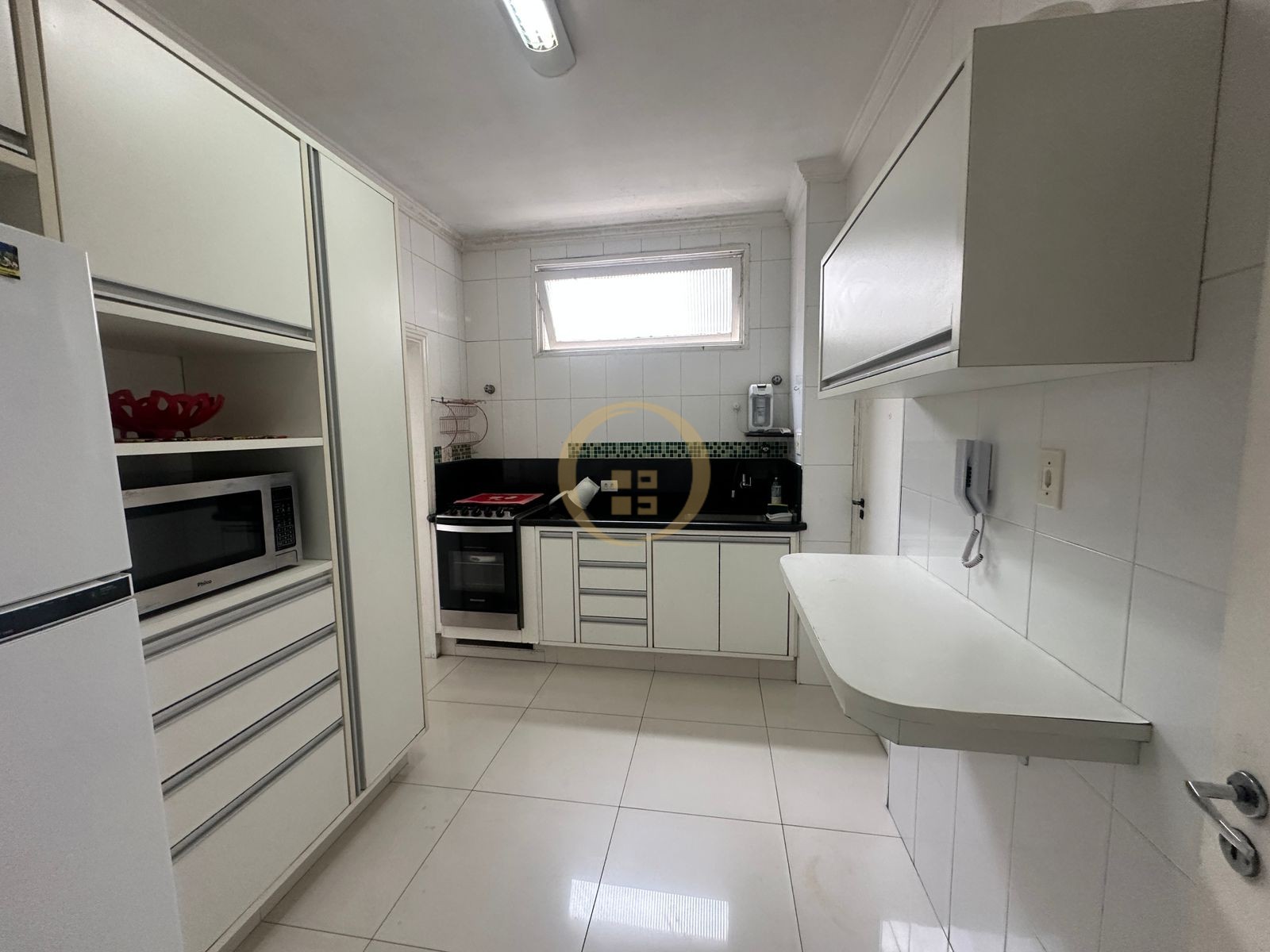 Apartamento na Praia das Pitangueiras, Guarujá - SP