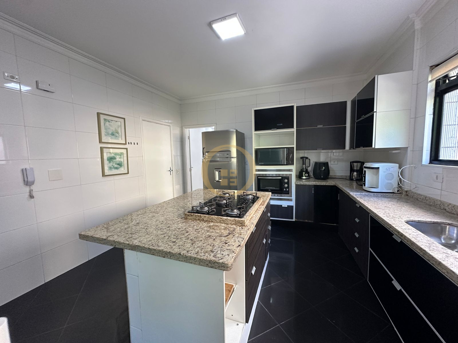 Apartamento na Praia das Pitangueiras, Guarujá - SP
